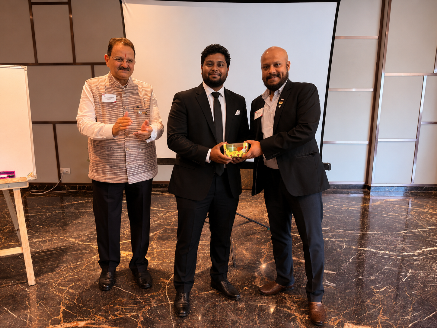 Indraneel being recognized at a BNI meeting